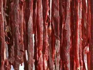 Meat strip-cutting